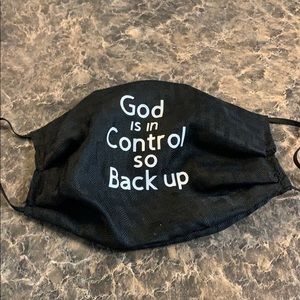 “God Is In Control So Back Up,” Mask